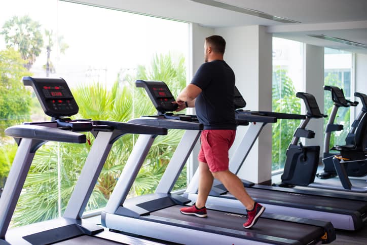 Male walking on a treadmill
