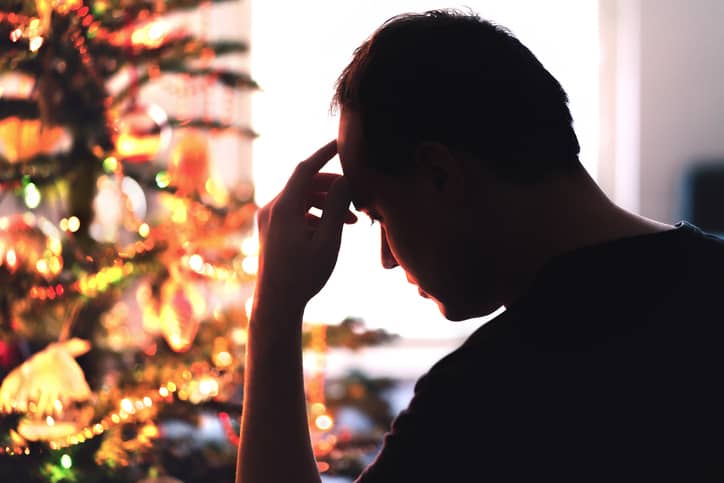 Man dealing with stress during the holidays.