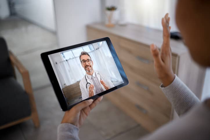 Telehealth doctor meeting with patient